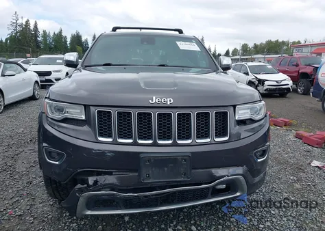 2014 Jeep Grand Cherokee Overland z USA, uszkodzony, nr VIN 1C4RJFCMXEC417525